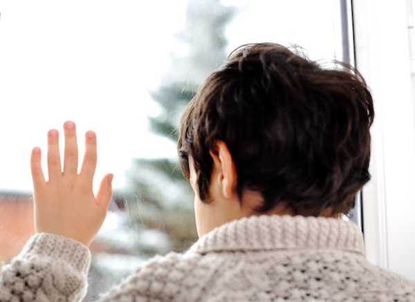 child looking out the window